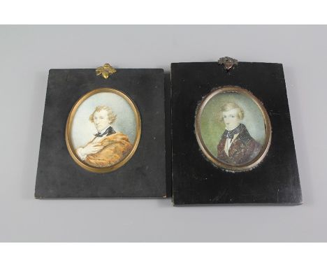 Two Victorian Oval Portrait Miniatures depicting a gentleman, approx 7.5 x 9 cms, ebony frames.