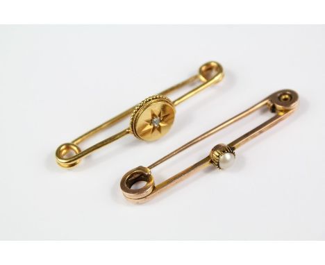 An Antique 9ct Yellow Gold Stick Pin, set with a rose-cut diamond, approx 4 cms l together with another 9ct gold stick pin se