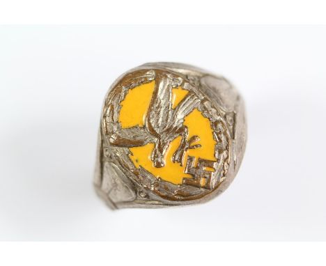 A German WWII Era Nazi White Metal and Yellow Enamel Ring, size S. (af)