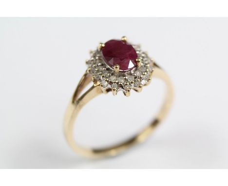 A Vintage 9ct Ruby and Diamond Ring, the oval ruby approx 7 x 5 mm, size P, approx 2.3 gms.