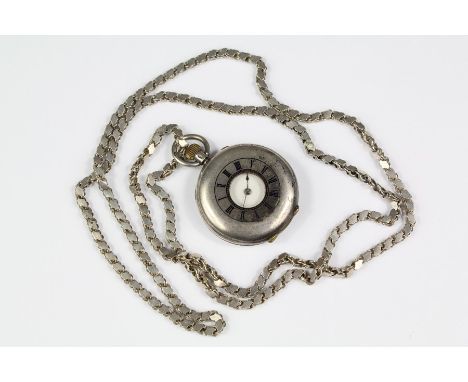 A Lady's Continental Silver Half Hunter Pocket Watch, the watch having enamel face with baton dial, on a silver chain approx 