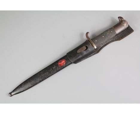 A German WWII Era Standard Issue Mauser Bayonet, scabbard painted with a winged lion.&nbsp;