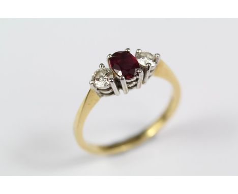 An Antique 18ct Yellow Gold Ruby and Diamond Ring. The oval-cut ruby approx 6 x 5 x 4 mm flanked by 2 x 16 pts of dias,&nbsp;