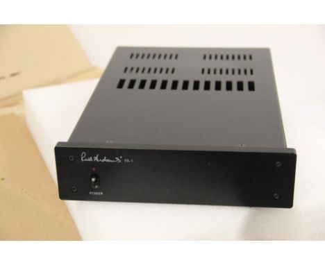 A Russ Andrews Amplifier - boxed and as new - high end piece of kit and sought after