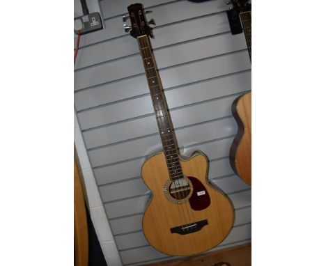 A Brunswick electro acoustic bass guitar, model TBJBA, with Stagg soft case