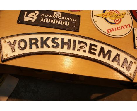 Cast iron Yorkshireman sign, L: 60 cm. P&amp;P Group 2 (£18+VAT for the first lot and £3+VAT for subsequent lots) 