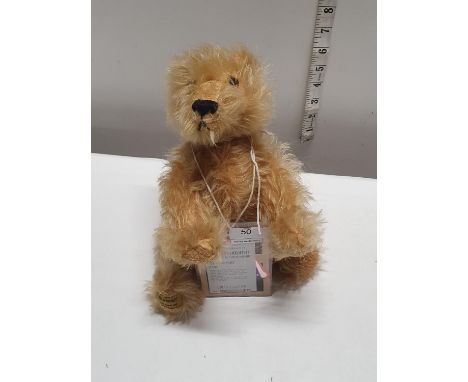 A Merrythought limited edition bear 'Baby Bear Heart' with tags.