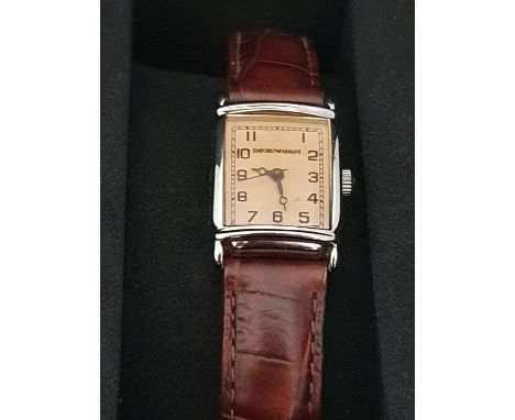 A boxed Emporio Armani ladies wrist watch