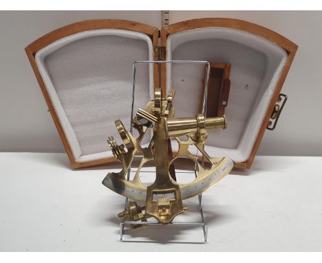 A boxed antique style heavy brass Naval sextant