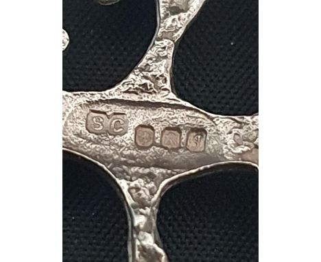 A hallmarked silver Celtic themed brooch