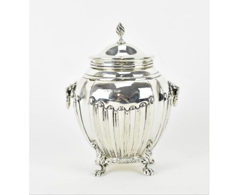 A George VI silver tea caddy by S Blanckensee &amp; Son Ltd, Birmingham 1945, of bombe form with fluted detail to the body, f