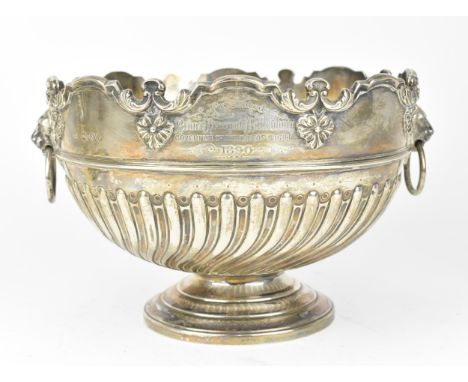 A Victorian silver presentation monteith bowl by William Hutton &amp; Sons (Edward Hutton), London 1889, the top with moulded