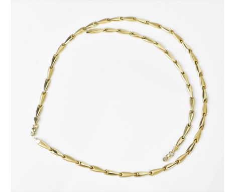 A 14ct yellow gold matching necklace and bracelet, with arrow style links alternating in satin and shine finish, with lobster