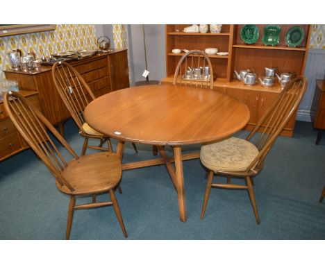 Ercol Oval Extending Dining Table with Four Ercol Chairs 