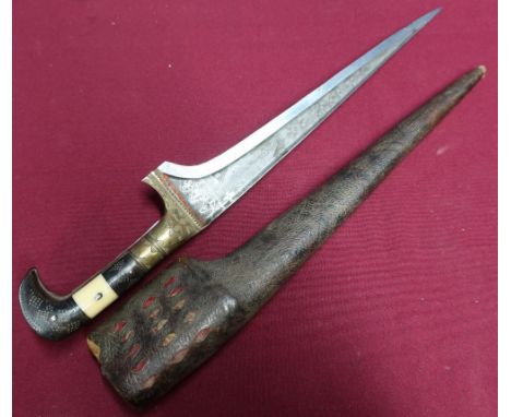 Indo-Persian dagger with triangular form tapering 9 1/2 inch blade with etched detail, the grip with engraved brass mounts, h