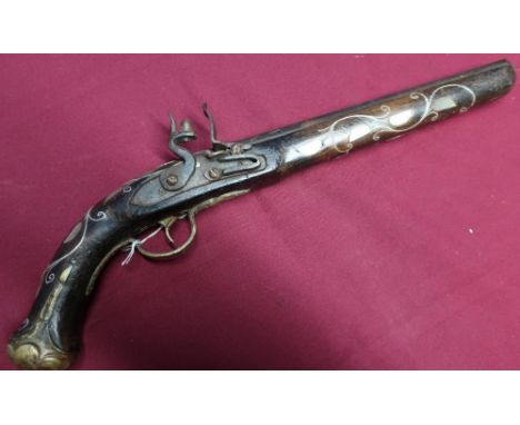 Turkish style flintlock pistol with 9 3/4 inch barrel, the stock with brass mounts, mother of pearl and wirework inlay 