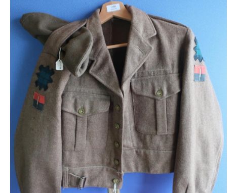 1949 pattern battle dress blouse, the label dated 1953 with Scottish regimental Black Watch shoulder flashes and tam o'shanty