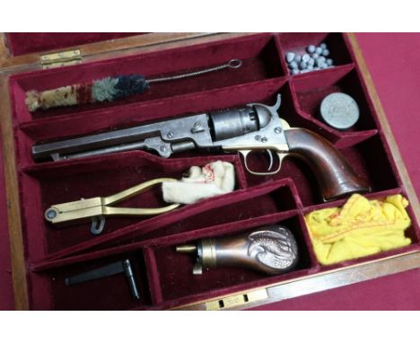 Mahogany cased Colt pocket navy percussion cap .36 single action revolver with traces of New York address to the top, the cyl