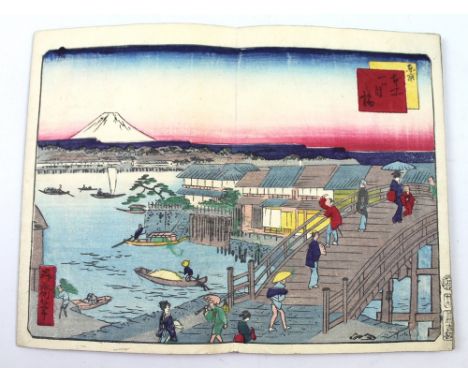 Japanese 19th century woodblock books, one with twenty two black and white block prints depicting the daily lives of people w
