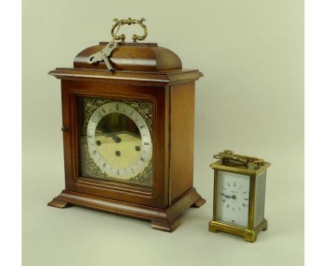 An oak cased carriage clock, brass face and spandrels, with German movement, 35cm high, together with a Bayard eight day carr