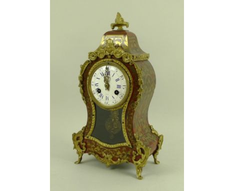 A late 19th century French boulle mantle clock, by Petonie, Paris, number 6921, with eight day striking movement, the enamel 