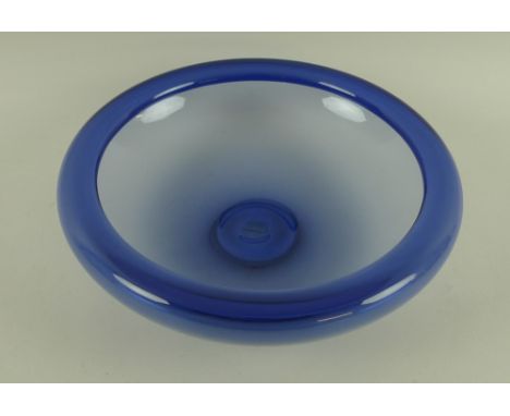 A blue glass bowl, 1960s/70s, by Per Lutken for Holmegaard, signed to base, 26cm diameter.