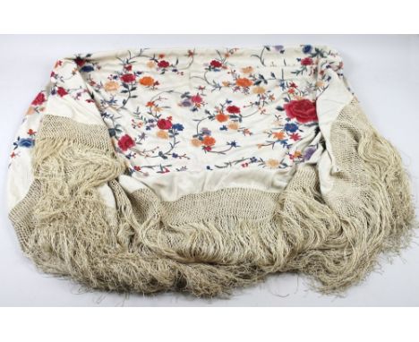Vintage Textiles: an Art Deco hand embroidered Chinese piano shawl, with cream deeply knotted fringe, the cream silk ground e