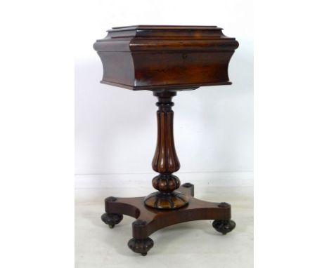 A William IV rosewood teapoy, caddy casket top with lift lid enclosing four fitted removable lidded boxes with leaded lining,