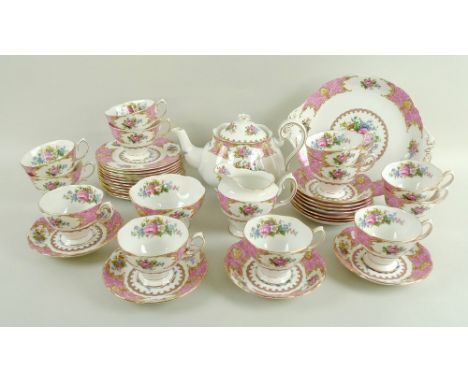 A Royal Albert bone china part tea set in the Lady Carlyle pattern, comprising a cake plate, teapot, sugar bowl, milk jug, tw