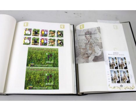 A collection of stamps including seven albums of first day covers,  together with six Tower albums of stamps including some m