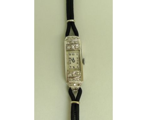 A lady's Art Deco diamond and platinum cocktail watch, set with twenty diamonds, total diamond weight approximately 0.5ct, th