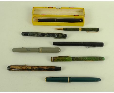 A collection of mostly fountain pens, including four by Swan, three of which have 14ct gold nibs, a Blackbird by Swan fountai
