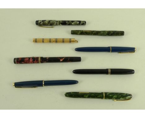 A group of fountain pens, including a Wahl Eversharp with 14ct gold nib, a Burnham Osmiroid, a Blackbird with 14ct gold nib, 