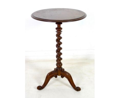 A Victorian mahogany circular occasional table, moulded edge, raised on a barley twist column, carved tripod base and scroll 