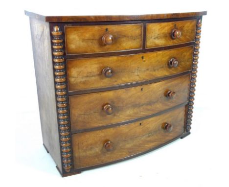 A Victorian mahogany bow fronted chest of two short over three long graduating drawers, possibly Scottish, with bobbin turned