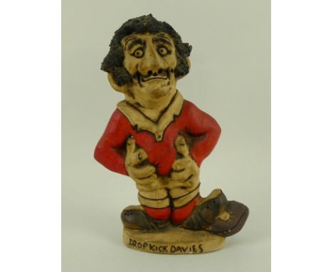 A John Hughes ceramic Grogg figure of rugby player Drop Kick Davies, incised to foot and signed to base, 21cm high.