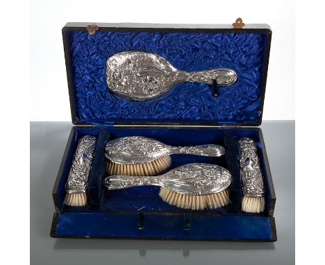 ART NOUVEAU SILVER DRESSING TABLE SET comprising hand mirror, pair of hair brushes and a pair of clothes brushes, Birmingham 