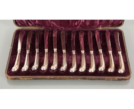 SET OF TWELVE SILVER HANDLED BUTTER KNIVES maker Harrison Brothers & Howson, Sheffield 1909, retailed by Hamilton & Inches, E