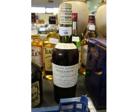 Approx 70cl bottle of Buchanan's 'Black &amp; White' Blended Scotch Whisky, pencil inscription to label reads 'N.J. Hall, Blu