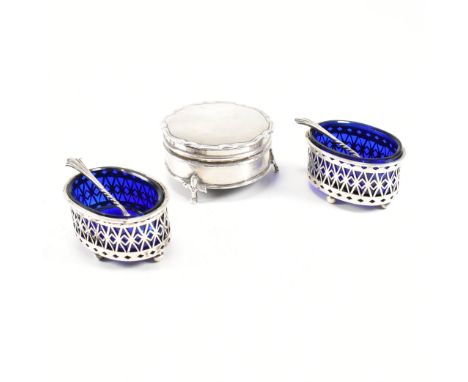 A late 19th Century and hallmarked silver items. The lot to include a pair of hallmarked silver salts. The salts having four 