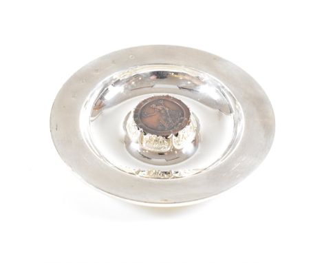 A limited edition Royal Mint Britannia hallmarked silver coin dish. The trinket dish having a textured rim with electrotype o