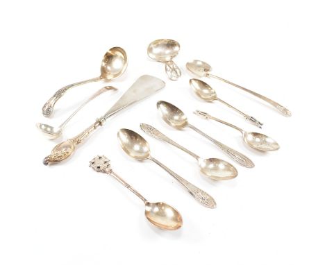 A collection of various hallmarked silver spoons and a shoe horn. The spoons to include a George III conserve spoon. Hallmark