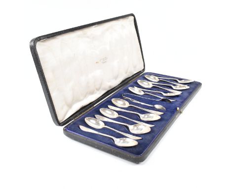 A cased set of 12 hallmarked silver tea spoons and a pair of sugar tongs. Hallmarked for Sheffield, 1904. Makers mark HA for&