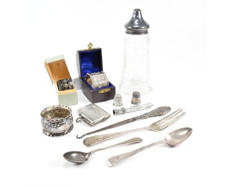 A collection of hallmarked silver items. The lot to include an Edward VII cased napkin ring of octagonal form with etched fol