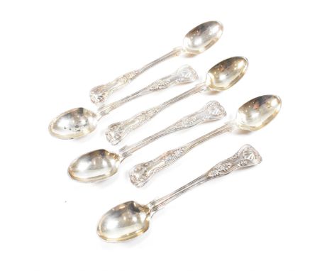 A set of six Victorian hallmarked silver tea spoons. The spoons having a moulded scrolled design with gilded bowls. Hallmarke