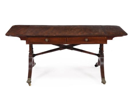 A George IV Irish mahogany sofa table, circa 1825, by Gillingtons, Dublin, the twin drop-leaf top above a pair of frieze draw