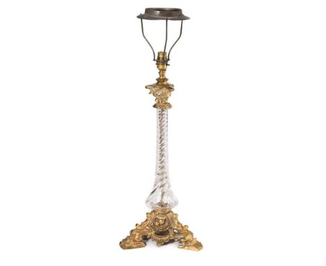 A gilt brass and moulded glass table lamp, 20th century, wired for electricity, 57cm high including electrical fitment Condit