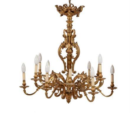  A twelve light brass and gilt chandelier in French taste, 20th century, 105cm high, 110cm wideCondition Report: Marks, knock
