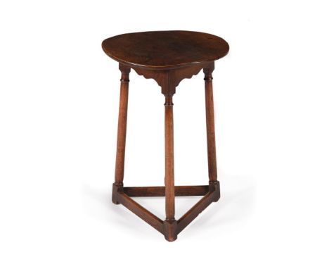 An elm cricket table, early 18th century, 68cm high, 49cm diameterCondition Report: Marks, knocks, scratches, abrasions consi