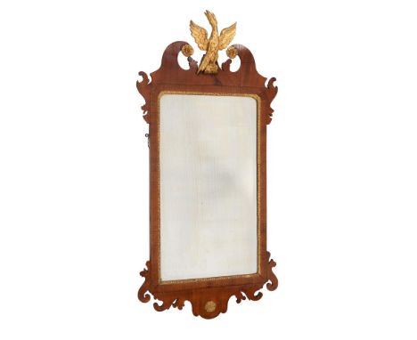A George II walnut and parcel gilt wall mirror, mid 18th century, 121cm high, 58cm wideCondition Report: Marks, knocks, scrat